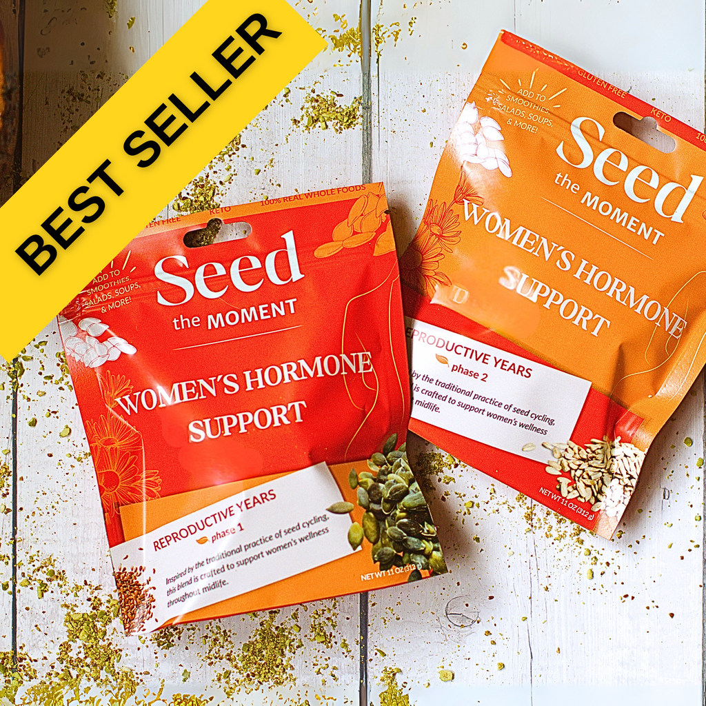 Two packages of 'Seed the Moment Women's Hormone Support' on a wooden surface with a 'Best Seller' label.